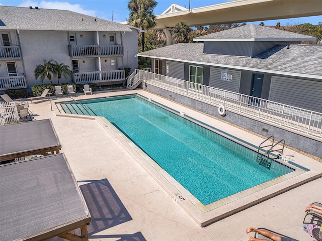 community pool with a patio