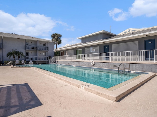 pool with a patio