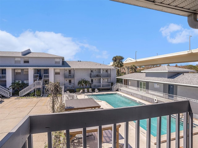 community pool featuring a patio