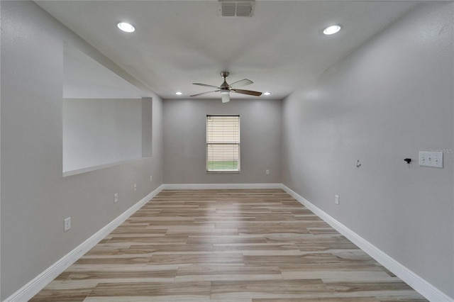 unfurnished room featuring ceiling fan, recessed lighting, visible vents, and baseboards