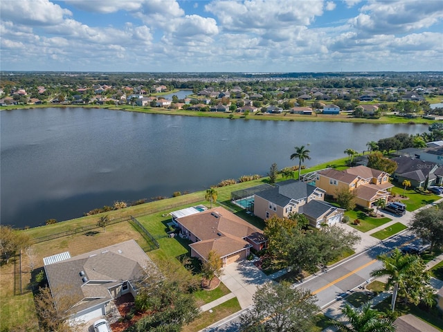 aerial view featuring a residential view and a water view