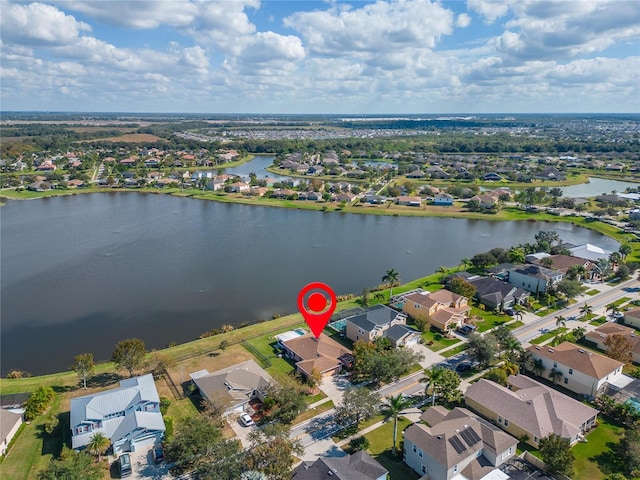 aerial view with a water view and a residential view