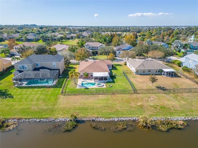 bird's eye view with a water view and a residential view