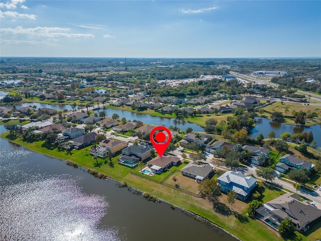 aerial view featuring a water view and a residential view