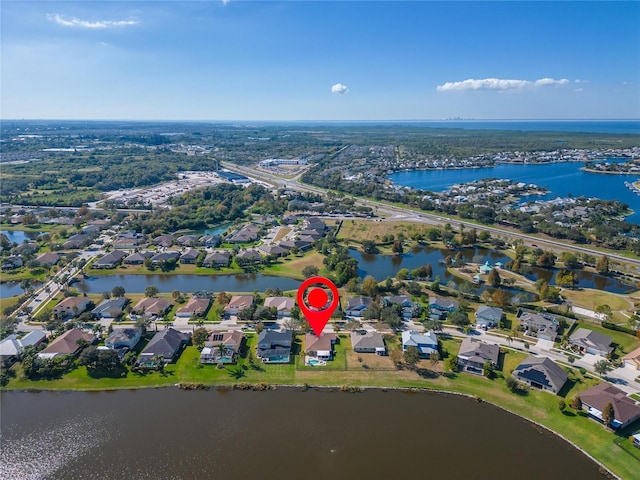 bird's eye view with a water view and a residential view