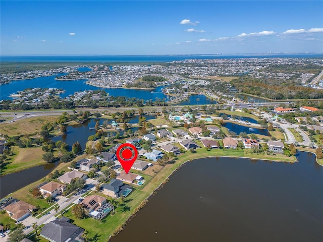 aerial view with a water view and a residential view