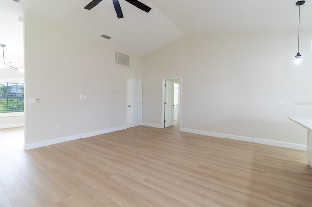 unfurnished living room featuring high vaulted ceiling, ceiling fan, and light hardwood / wood-style flooring