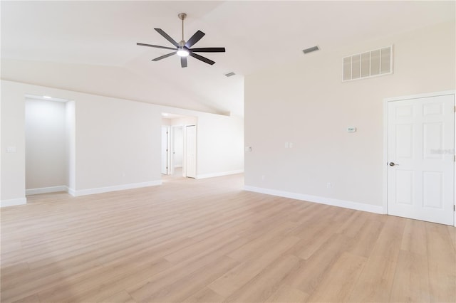 empty room with light wood-type flooring, high vaulted ceiling, and ceiling fan