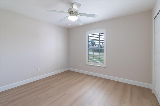 unfurnished room featuring ceiling fan and light hardwood / wood-style floors