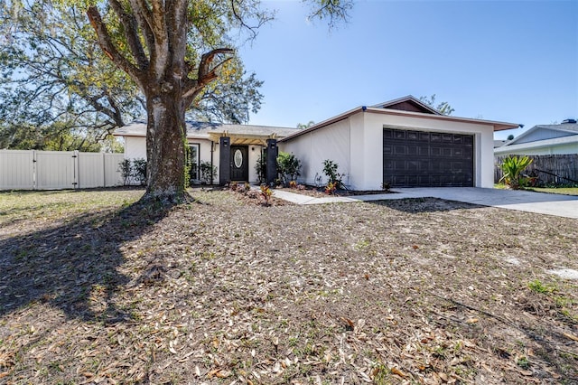 single story home with a garage