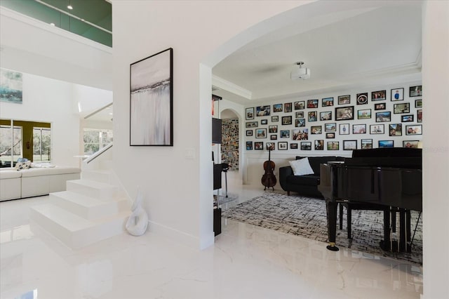 interior space with crown molding