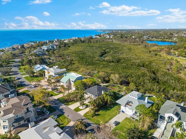 aerial view with a residential view and a water view