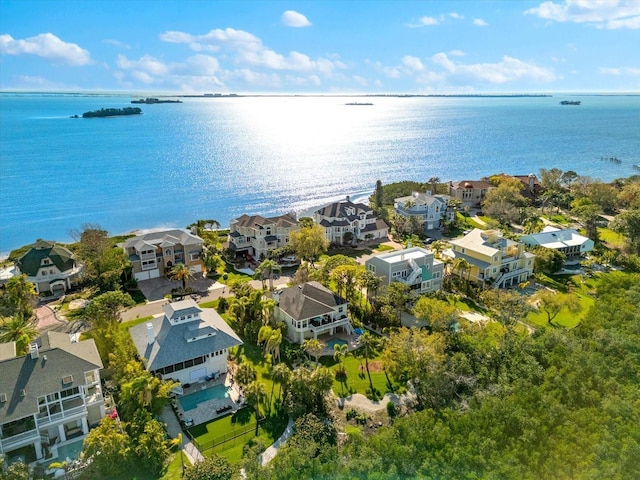 aerial view with a residential view and a water view