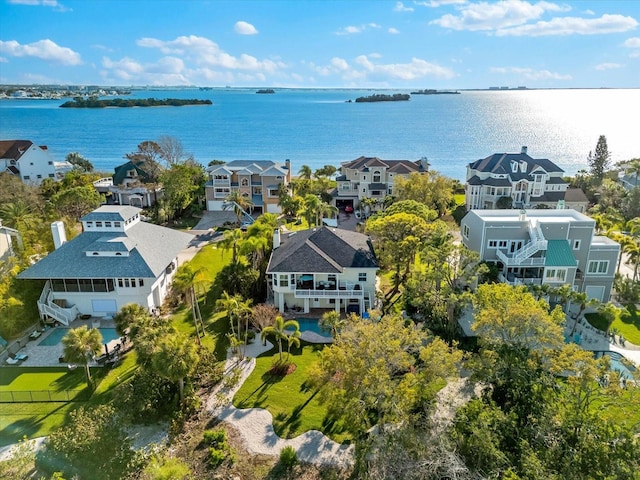 aerial view with a residential view and a water view