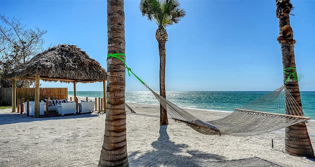 property view of water with a gazebo