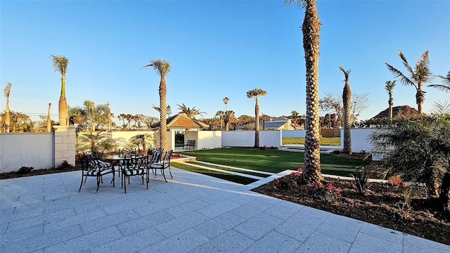 view of patio / terrace featuring fence