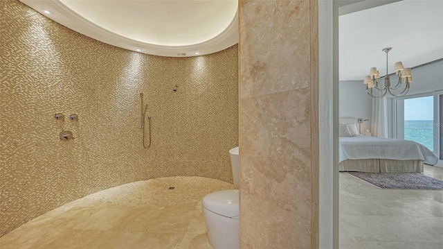 bathroom with toilet, an inviting chandelier, connected bathroom, and tiled shower