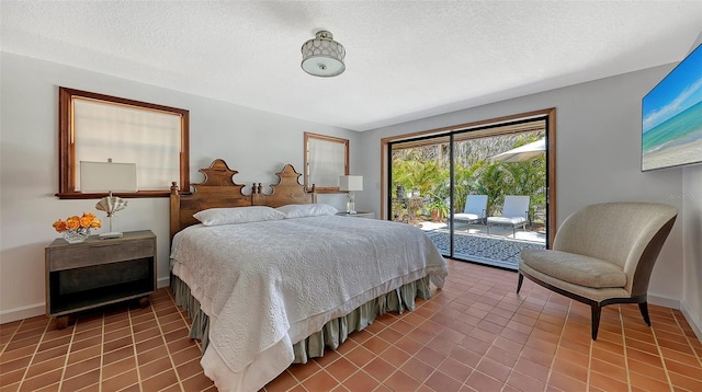 bedroom with a textured ceiling, access to outside, baseboards, and tile patterned floors