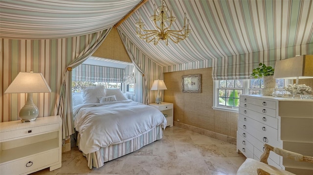 bedroom featuring baseboards and wallpapered walls