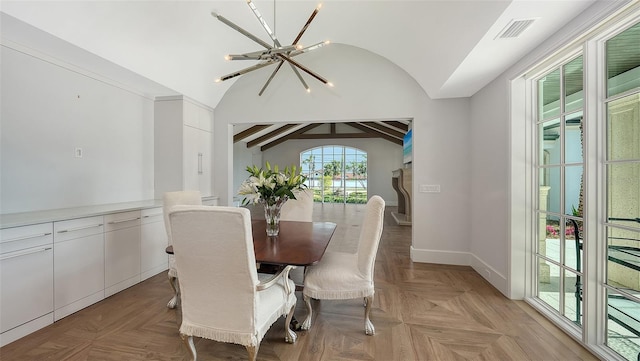 dining space with vaulted ceiling with beams, visible vents, a notable chandelier, and baseboards