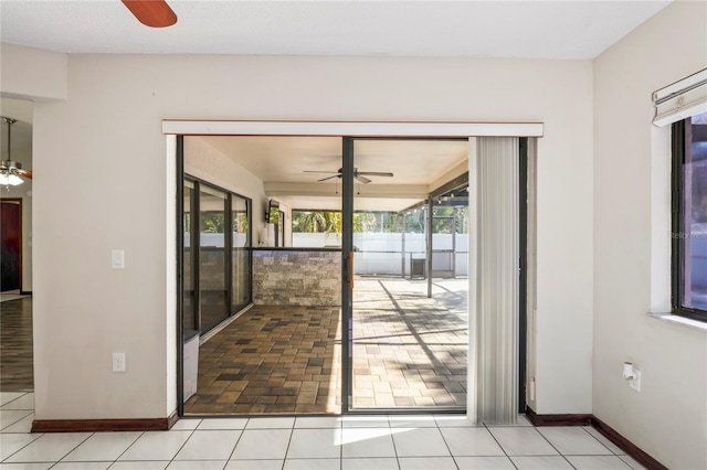 13112 Groveland St, Spring Hill, FL 34609 - entryway with ceiling fan and light tile patterned floors