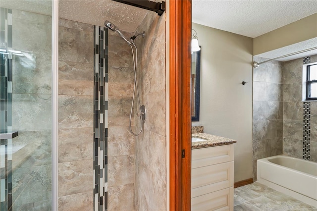13112 Groveland St, Spring Hill, FL 34609 - bathroom featuring tiled shower / bath combo, a textured ceiling, vanity, and tile patterned floors