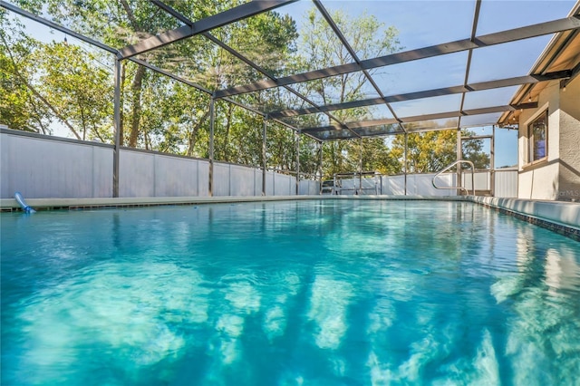 13112 Groveland St, Spring Hill, FL 34609 - view of swimming pool with a lanai, fence, and a fenced in pool