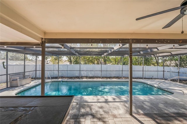 13112 Groveland St, Spring Hill, FL 34609 - view of swimming pool featuring a fenced in pool, a lanai, fence, and a patio