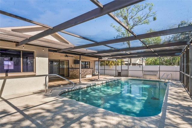 13112 Groveland St, Spring Hill, FL 34609 - view of pool with a patio, a lanai, a fenced in pool, and fence