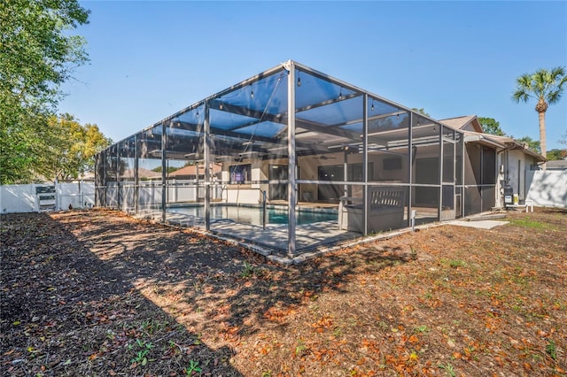 13112 Groveland St, Spring Hill, FL 34609 - view of pool with a fenced in pool, a lanai, fence, and a patio