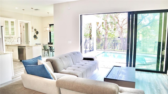 living area with light wood-style floors