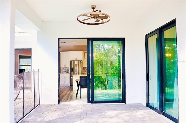 interior space featuring a ceiling fan