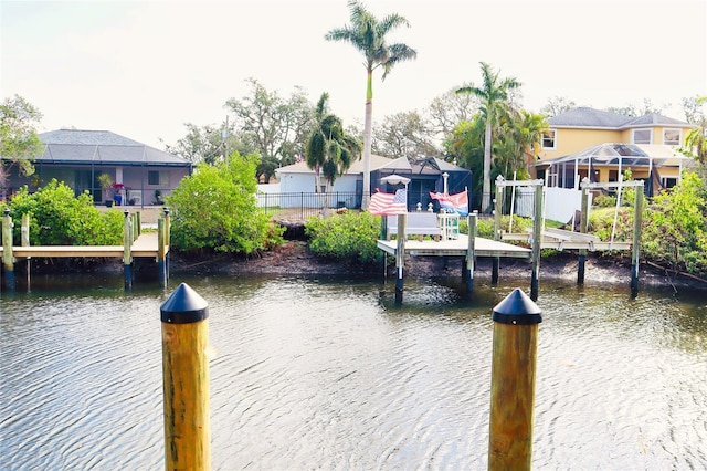 dock area featuring a water view