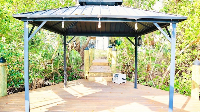 wooden deck featuring a gazebo