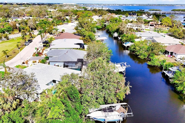 bird's eye view with a water view and a residential view