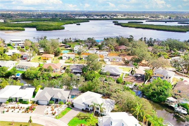 aerial view featuring a water view and a residential view