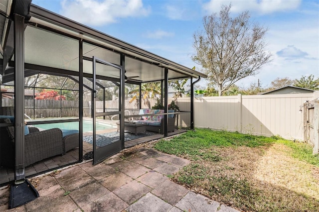 view of pool with a fenced backyard, an outdoor living space, and a patio