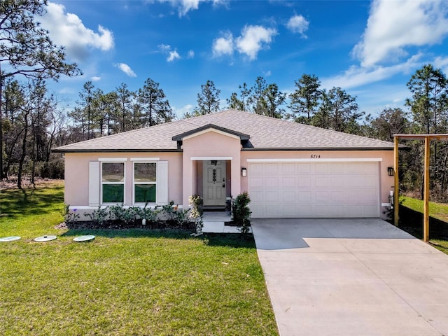 ranch-style home featuring roof with shingles, stucco siding, concrete driveway, an attached garage, and a front yard