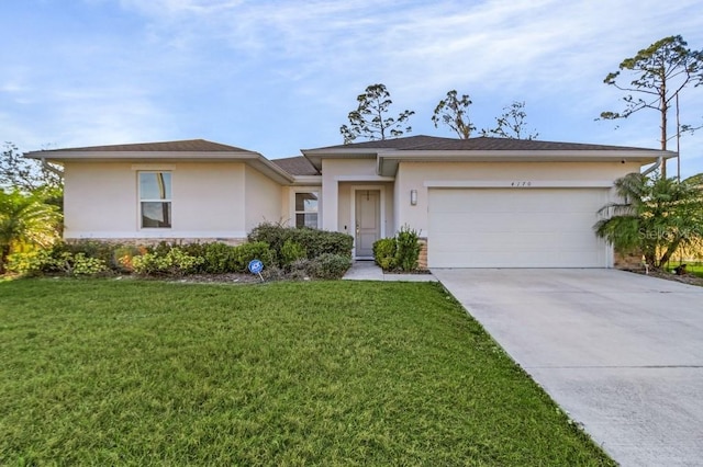 view of front of house featuring an attached garage, driveway, stone siding, stucco siding, and a front yard