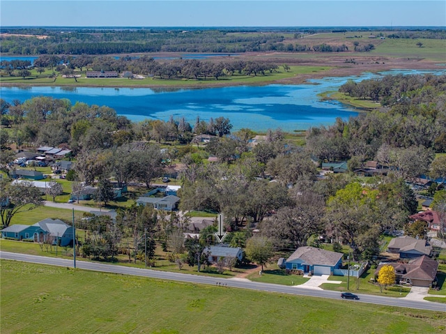 bird's eye view with a water view and a residential view