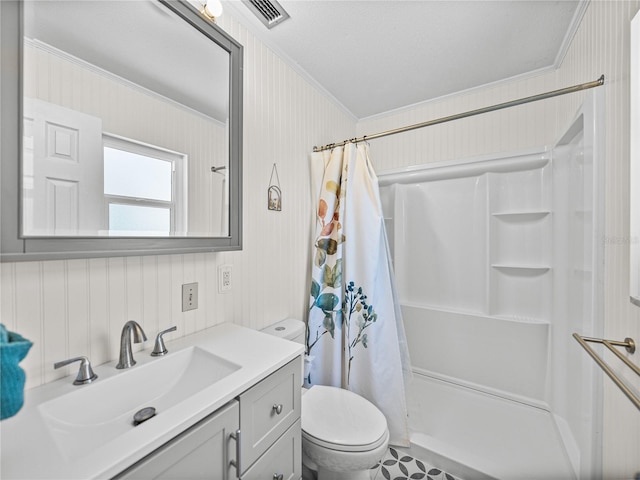 full bath with toilet, visible vents, crown molding, and vanity