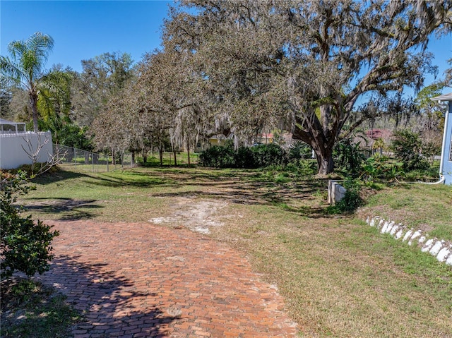 view of yard with fence