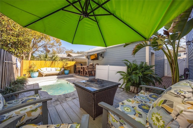 4301 W San Luis St, Tampa, FL 33629 - exterior space featuring a fenced in pool, a fenced backyard, and an outdoor living space