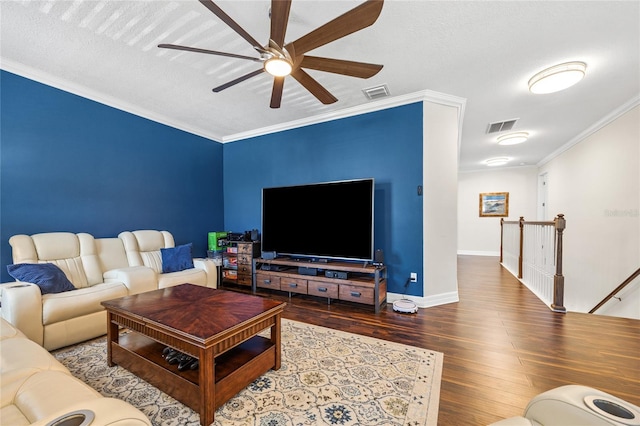 4301 W San Luis St, Tampa, FL 33629 - living room featuring ornamental molding, wood finished floors, visible vents, and a ceiling fan