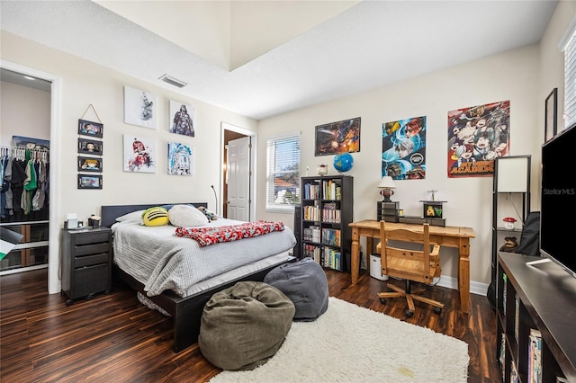 4301 W San Luis St, Tampa, FL 33629 - bedroom featuring dark wood-type flooring, visible vents, and baseboards