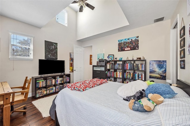 4301 W San Luis St, Tampa, FL 33629 - bedroom featuring baseboards, visible vents, ceiling fan, dark wood-type flooring, and a high ceiling