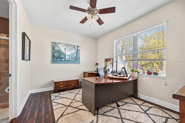 4301 W San Luis St, Tampa, FL 33629 - office area with light wood finished floors, a ceiling fan, and baseboards