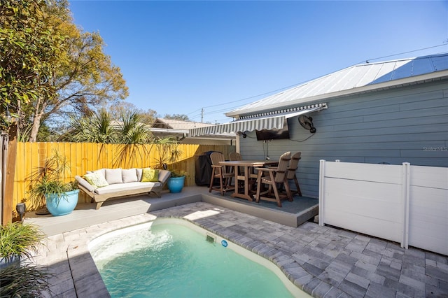 4301 W San Luis St, Tampa, FL 33629 - view of pool featuring a fenced in pool, a patio, a fenced backyard, outdoor lounge area, and outdoor dining space