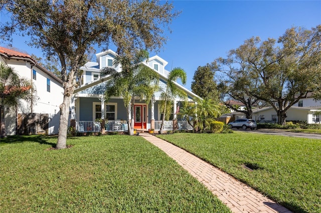 4301 W San Luis St, Tampa, FL 33629 - view of front facade with a porch and a front yard