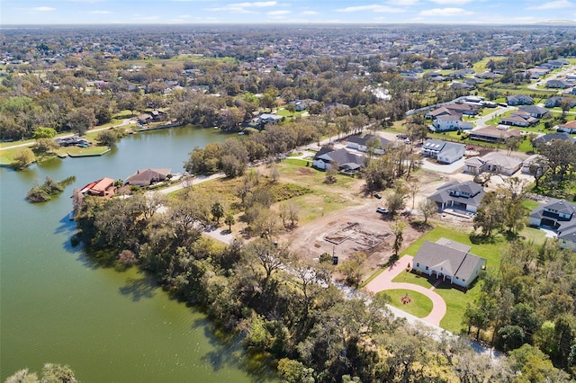 bird's eye view with a water view and a residential view